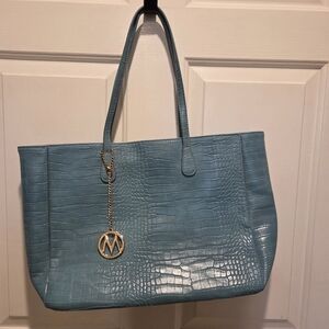 Turquoise purse By Mia K Farrow